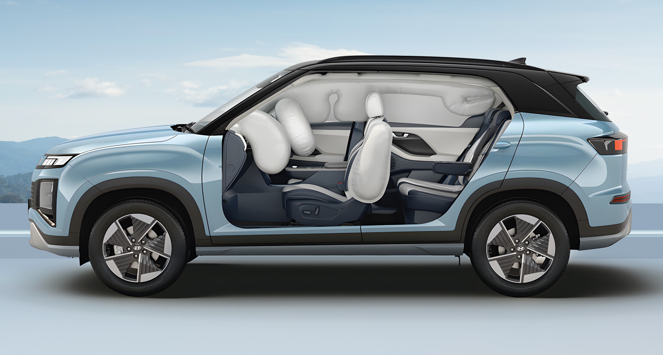 Side top view of white Creta with transparent doors and sunroof to show the interior